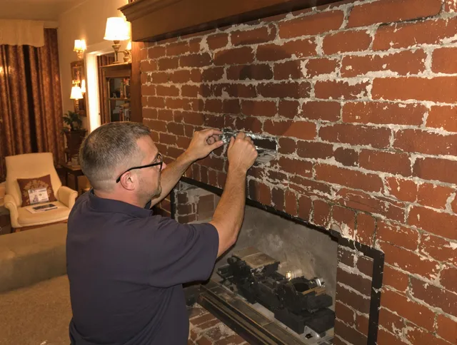 Rowland Heights Chimney Sweep expert fixing a fireplace in Rowland Heights, CA